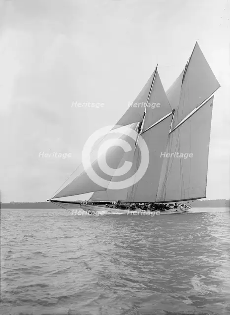 The 250 ton schooner 'Germania' sails close-hauled, 1913. Creator: Kirk & Sons of Cowes.