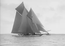 The 250 ton schooner Germania sails on a reach, 1913. Creator: Kirk & Sons of Cowes
