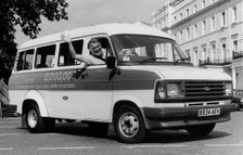 The 2 millionth Ford Transit minibus for schools with Dr David Bellamy. Creator: Unknown