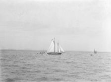 The 21-ton schooner Diablesse leaving Cowes for America, 1922. Creator: Kirk & Sons of Cowes
