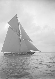 The 221 ton gaff-rigged cutter Britannia sailing close-hauled, 1913. Creator: Kirk & Sons of Cowes
