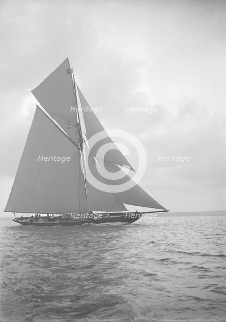 The 221 ton gaff-rigged cutter 'Britannia' sailing close-hauled, 1913. Creator: Kirk & Sons of Cowes.