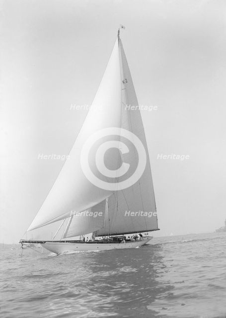 The 23-metre cutter 'Astra' sailing close-hauled, 1928. Creator: Kirk & Sons of Cowes.