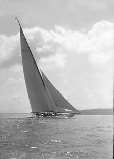 The 23-metre cutter Astra sailing close-hauled, 1931. Creator: Kirk & Sons of Cowes