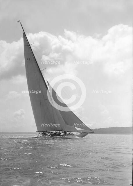 The 23-metre cutter 'Astra' sailing close-hauled, 1931. Creator: Kirk & Sons of Cowes.