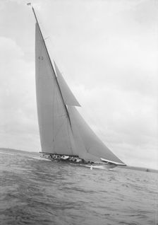 The 23-metre cutter Astra sailing close-hauled, 1932. Creator: Kirk & Sons of Cowes