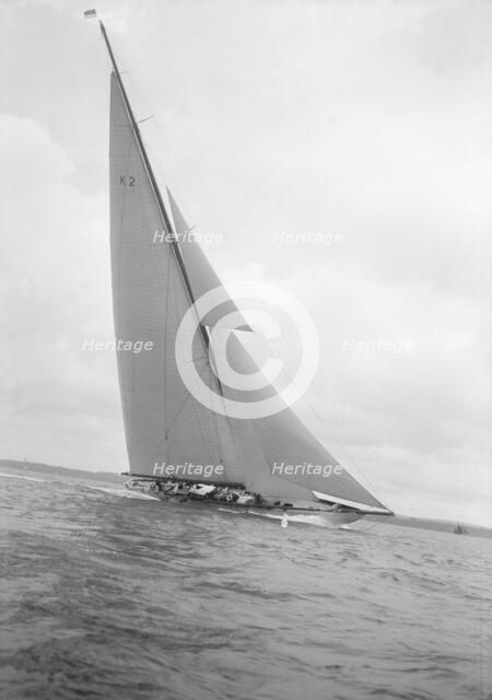 The 23-metre cutter 'Astra' sailing close-hauled, 1932. Creator: Kirk & Sons of Cowes.