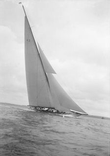 The 23-metre cutter Astra sailing close-hauled, 1932. Creator: Kirk & Sons of Cowes