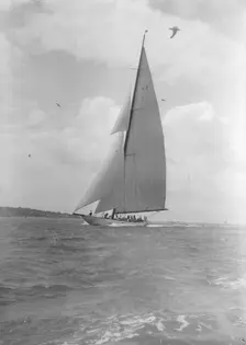 The 23-metre cutter Astra sailing close-hauled, 1933. Creator: Kirk & Sons of Cowes