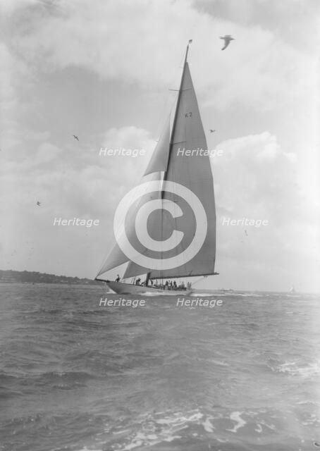 The 23-metre cutter 'Astra' sailing close-hauled, 1933. Creator: Kirk & Sons of Cowes.