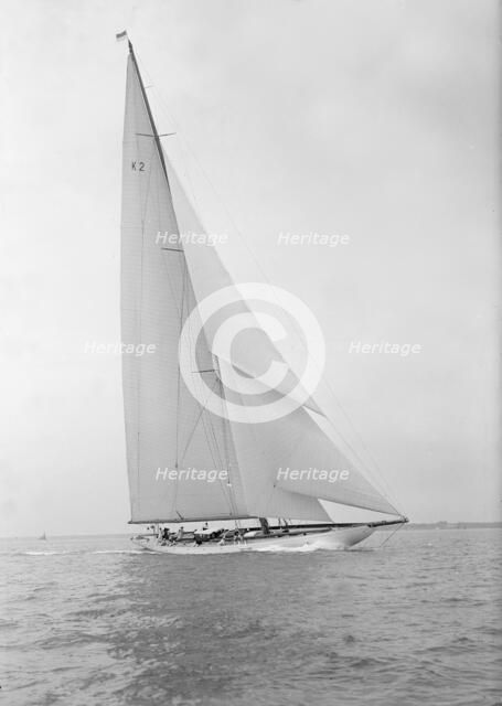 The 23-metre cutter 'Astra' sailing close-hauled, 1933. Creator: Kirk & Sons of Cowes.