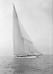 The 23-metre cutter Astra sailing close-hauled, 1933. Creator: Kirk & Sons of Cowes