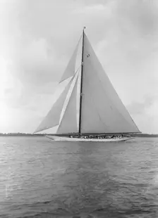 The 23-metre cutter Astra sailing close-hauled. Creator: Kirk & Sons of Cowes
