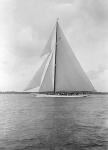 The 23-metre cutter Astra sailing close-hauled. Creator: Kirk & Sons of Cowes