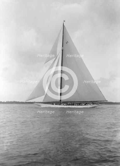 The 23-metre cutter 'Astra' sailing close-hauled. Creator: Kirk & Sons of Cowes.