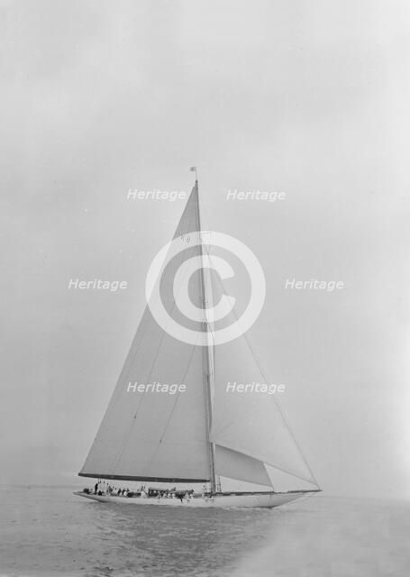 The 23 Metre 'Candida' sailing close-hauled, 1935. Creator: Kirk & Sons of Cowes.