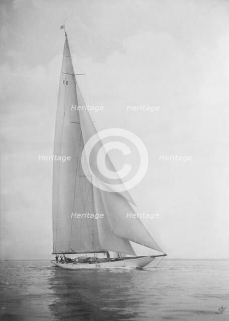 The 23 Metre 'Candida' sailing close-hauled, 1935. Creator: Kirk & Sons of Cowes.