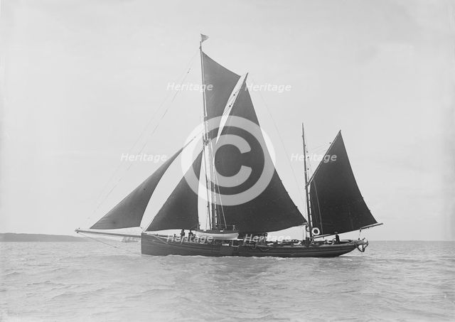 The 35 ton ketch 'Brown Mouse' under sail, 1912. Creator: Kirk & Sons of Cowes.