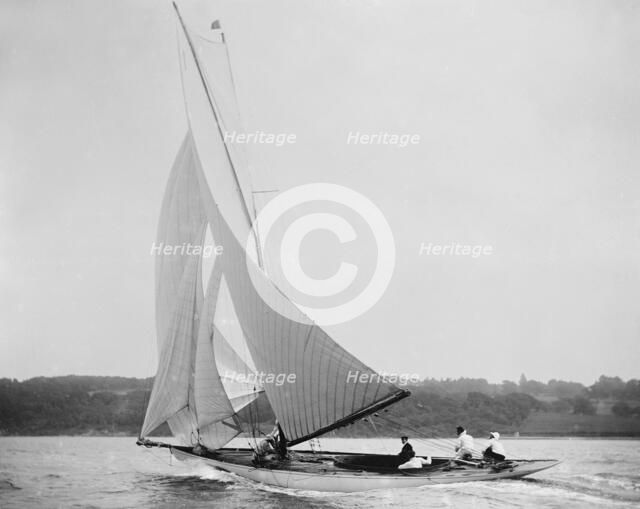 The 36 ft 'Edie II' running downwind. Creator: Kirk & Sons of Cowes.