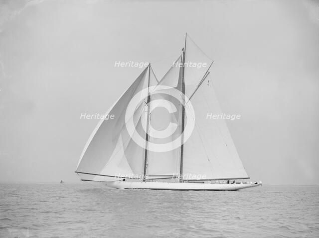 The 380 ton A Class schooner 'Margherita' sailing under spinnaker, 1913. Creator: Kirk & Sons of Cowes.