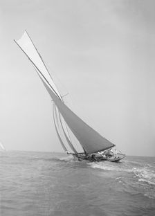 The 45 ton cutter Camellia sailing close-hauled, 1911. Creator: Kirk & Sons of Cowes