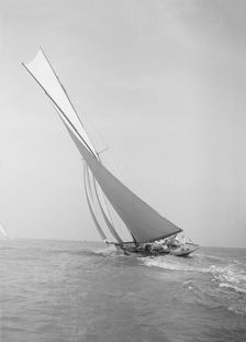 The 45 ton cutter Camellia sailing close-hauled, 1911. Creator: Kirk & Sons of Cowes
