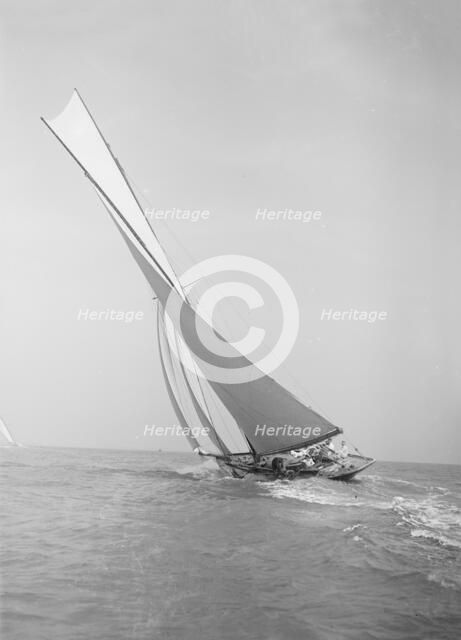 The 45 ton cutter 'Camellia' sailing close-hauled, 1911. Creator: Kirk & Sons of Cowes.