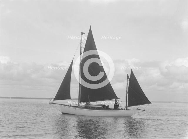The 4 ton yawl 'Mandy' under sail, 1922. Creator: Kirk & Sons of Cowes.