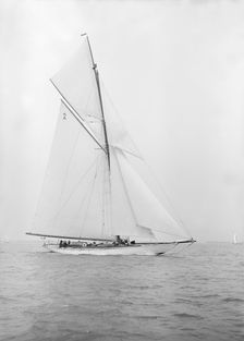 The 40-rater cutter Carina sailing close-hauled, 1913. Creator: Kirk & Sons of Cowes