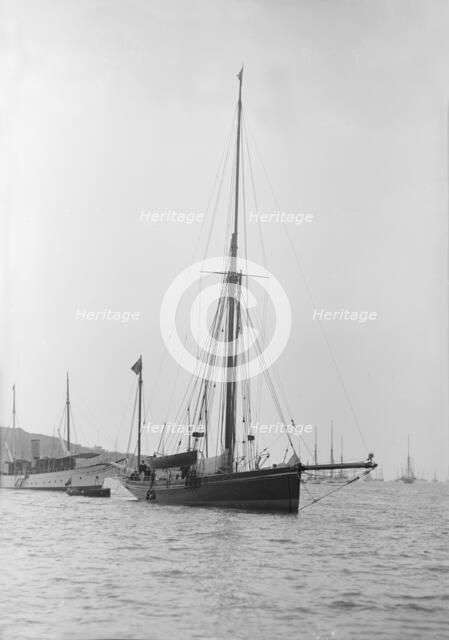 The 40 ton yawl 'Hyacinth' at anchor, 1913. Creator: Kirk & Sons of Cowes.