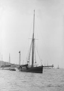 The 40 ton yawl Hyacinth at anchor, 1913. Creator: Kirk & Sons of Cowes