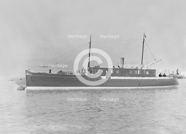 The 65 ton motor yacht 'Mairi' at anchor, 1921. Creator: Kirk & Sons of Cowes.