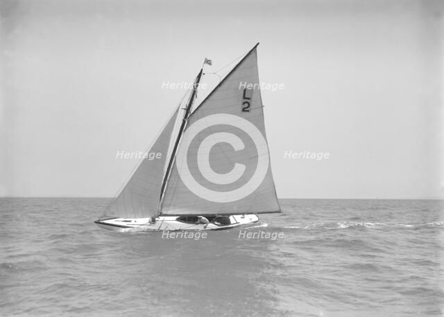 The 6 Metre 'Correnzia' close-hauled, 1911. Creator: Kirk & Sons of Cowes.