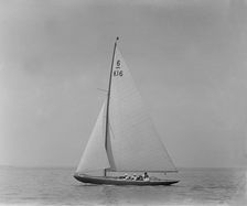 The 6 Metre class boat Jean (K16) sailing close-hauled, 1921. Creator: Kirk & Sons of Cowes