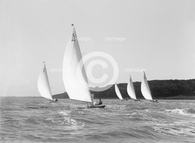 The 6 Metre class 'Bubble', 'Wambat', 'Lanka', 'Stella' and 'Vanda' racing on the Solent, 1914. Creator: Kirk & Sons of Cowes.