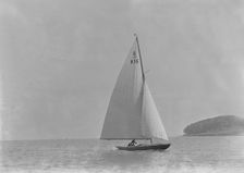 The 6 Metre class Jean (K16) sailing in light winds, 1921. Creator: Kirk & Sons of Cowes