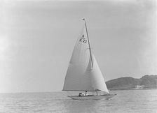 The 6 Metre class Maid Marion (K22) sailing close-hauled, 1921. Creator: Kirk & Sons of Cowes