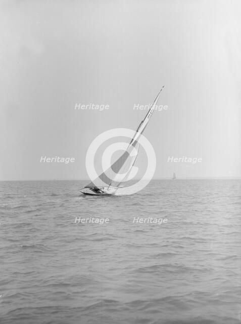 The 6 Metre class 'Nurdug III' sailing upwind, 1913. Creator: Kirk & Sons of Cowes.