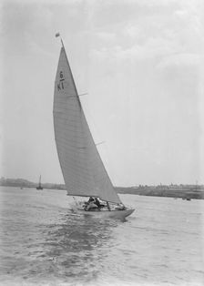 The 6 Metre class sailing yacht Reg 1922. Creator: Kirk & Sons of Cowes