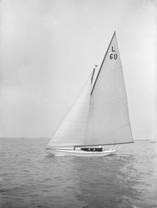 The 6 Metre class Sans-Souci sailing upwind. Creator: Kirk & Sons of Cowes