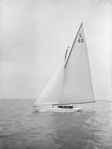 The 6 Metre class Sans-Souci sailing upwind. Creator: Kirk & Sons of Cowes