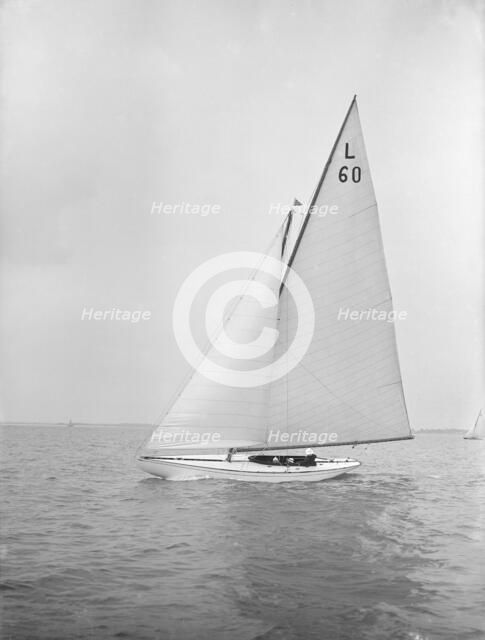 The 6 Metre class 'Sans-Souci' sailing upwind. Creator: Kirk & Sons of Cowes.