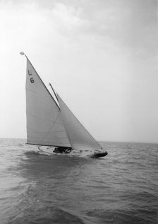 The 6 Metre Class The Whim sailing close-hauled. Creator: Kirk & Sons of Cowes