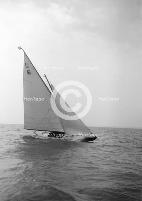 The 6 Metre Class 'The Whim' sailing close-hauled. Creator: Kirk & Sons of Cowes.