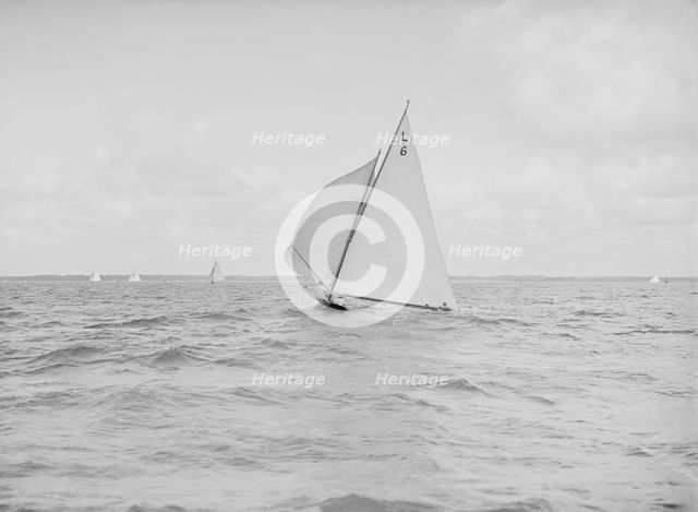 The 6 Metre Class 'The Whim' running downwind, 1912. Creator: Kirk & Sons of Cowes.