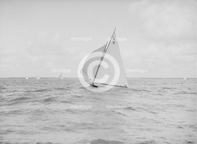 The 6 Metre Class 'The Whim' running downwind, 1912. Creator: Kirk & Sons of Cowes.