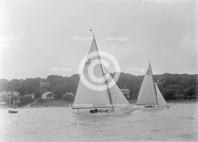 The 6 Metre Class yachts 'Oui-Oui' (D15) and 'Gairney' racing, 1922. Creator: Kirk & Sons of Cowes.