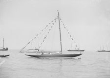 The 6 Metre Cremona moored with flags, 1913. Creator: Kirk & Sons of Cowes