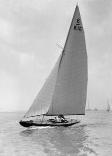 The 6 Metre Jean (K16) sailing upwind, 1922. Creator: Kirk & Sons of Cowes