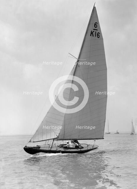 The 6 Metre 'Jean' (K16) sailing upwind, 1922. Creator: Kirk & Sons of Cowes.